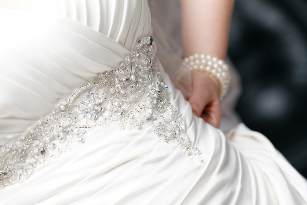 Beautiful wedding dress decoration close up