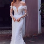 A-line wedding dresses with sleeves in elegant bridal settings