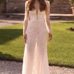 Boho style wedding dresses from Aphrodite Bridal, showcasing flowing silhouettes and intricate lace details.